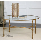 Tavolino ovale Uttermost Vitya – Base in ferro battuto con finitura foglia oro, piano in vetro temperato, 40"L