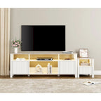 Mobile TV moderno a LED per televisori da 75" – Piano con motivo in pietra, ante in legno scanalato e illuminazione a LED calda